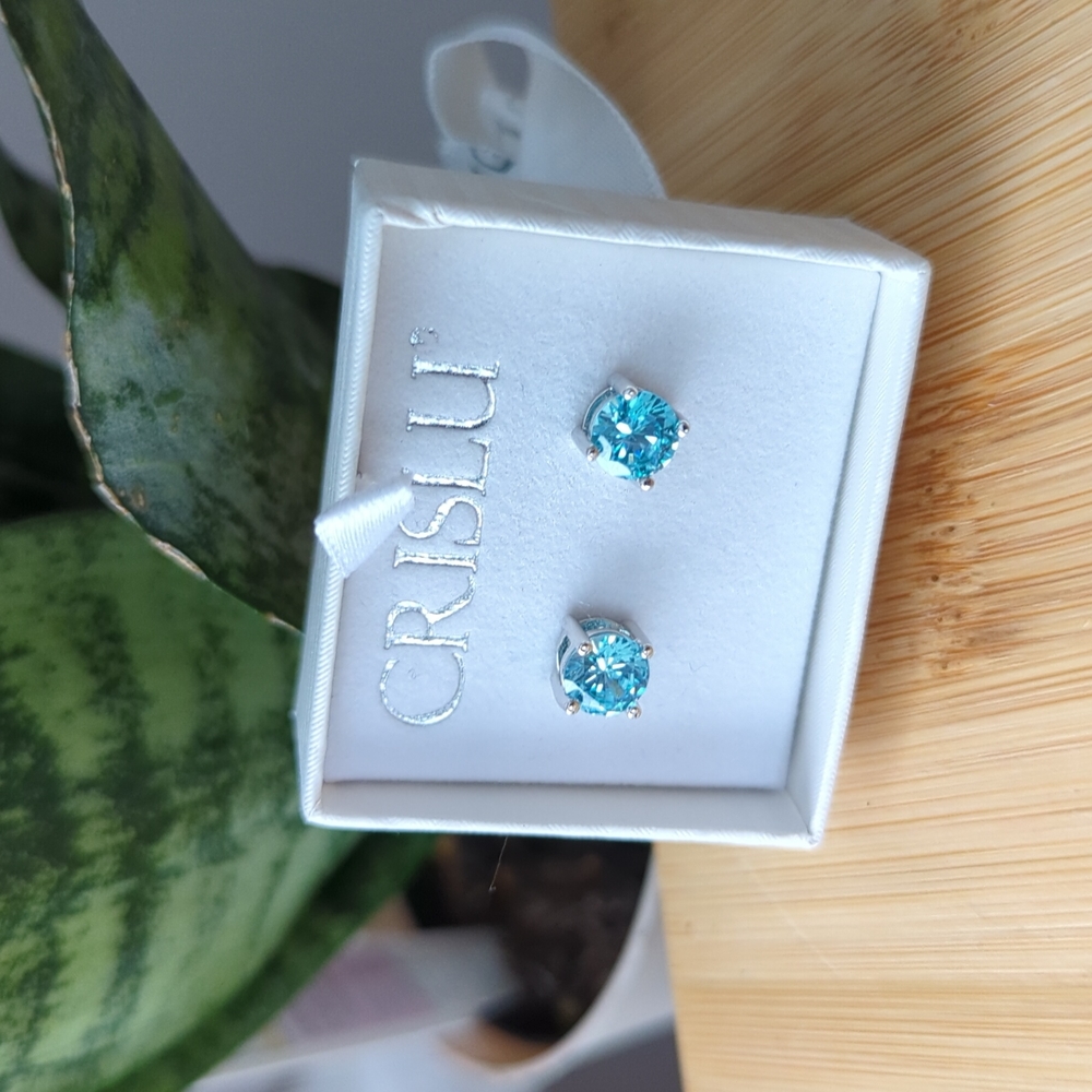 NIB Crislu stud earrings - light blue